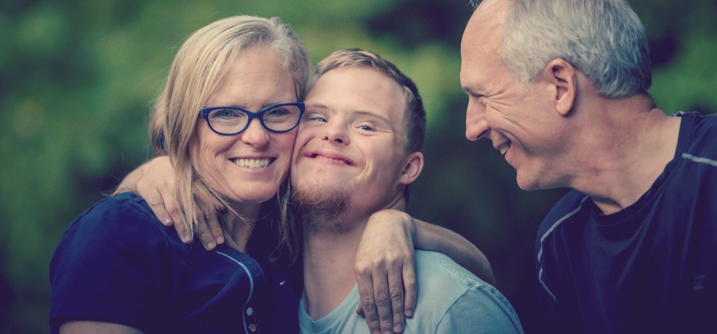 Smiling clients who have perhaps been the beneficiaries of a complex home modification funded by the NDIS 